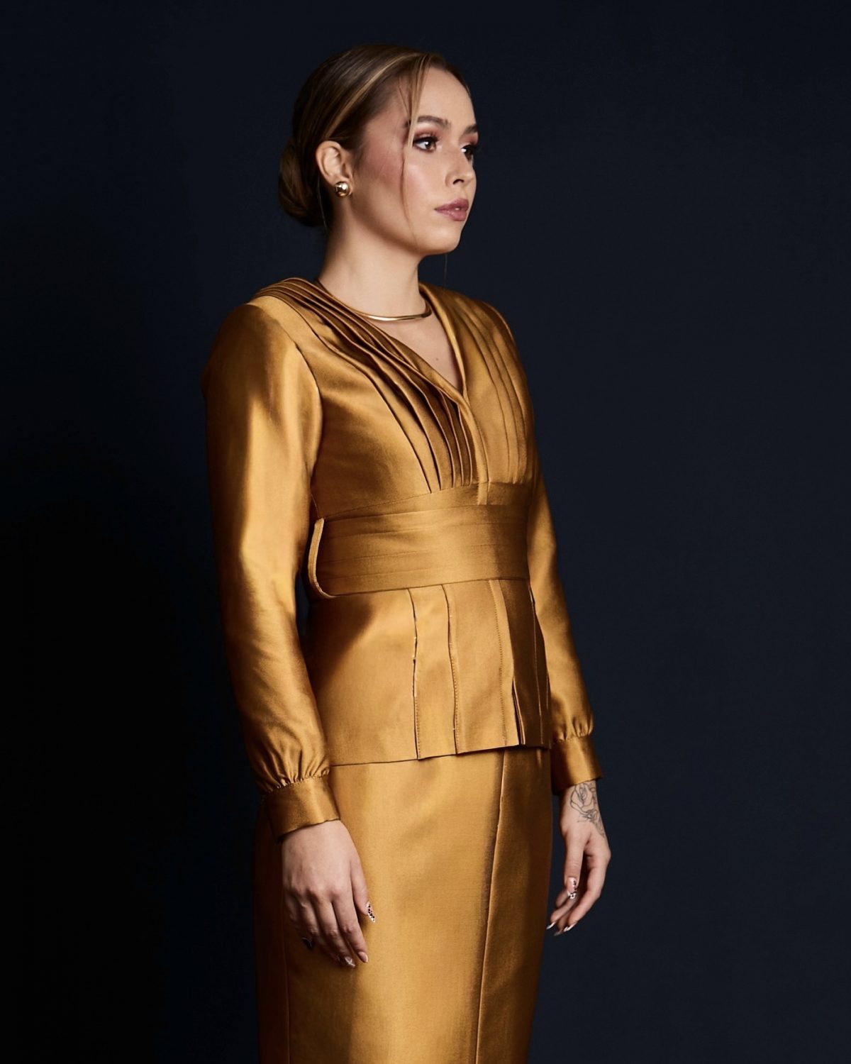 Saco Qanra dorado